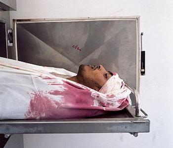    World Press Photo  : Kristen Ashburn, USA, Contact Press Images Paul Vreeker, The Netherlands, Reuters