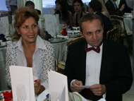 Олег Насобин, президент компании Green Mama с супругой